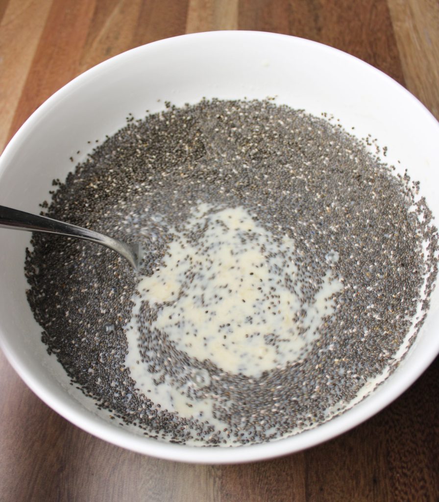 Bowl of chia seed ingredients mixed together.