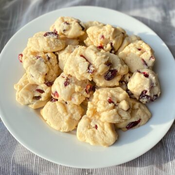 plate of cranberry almond cookies