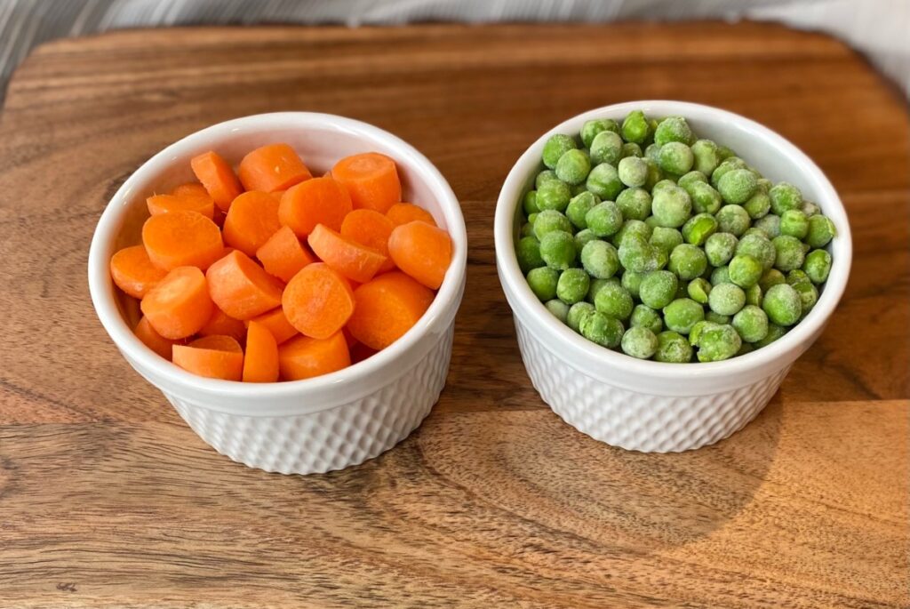 little bowls of peas and carrots