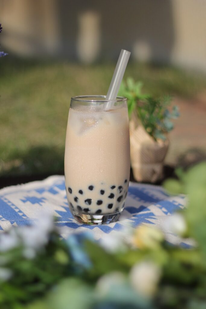 boba tea in glass with straw