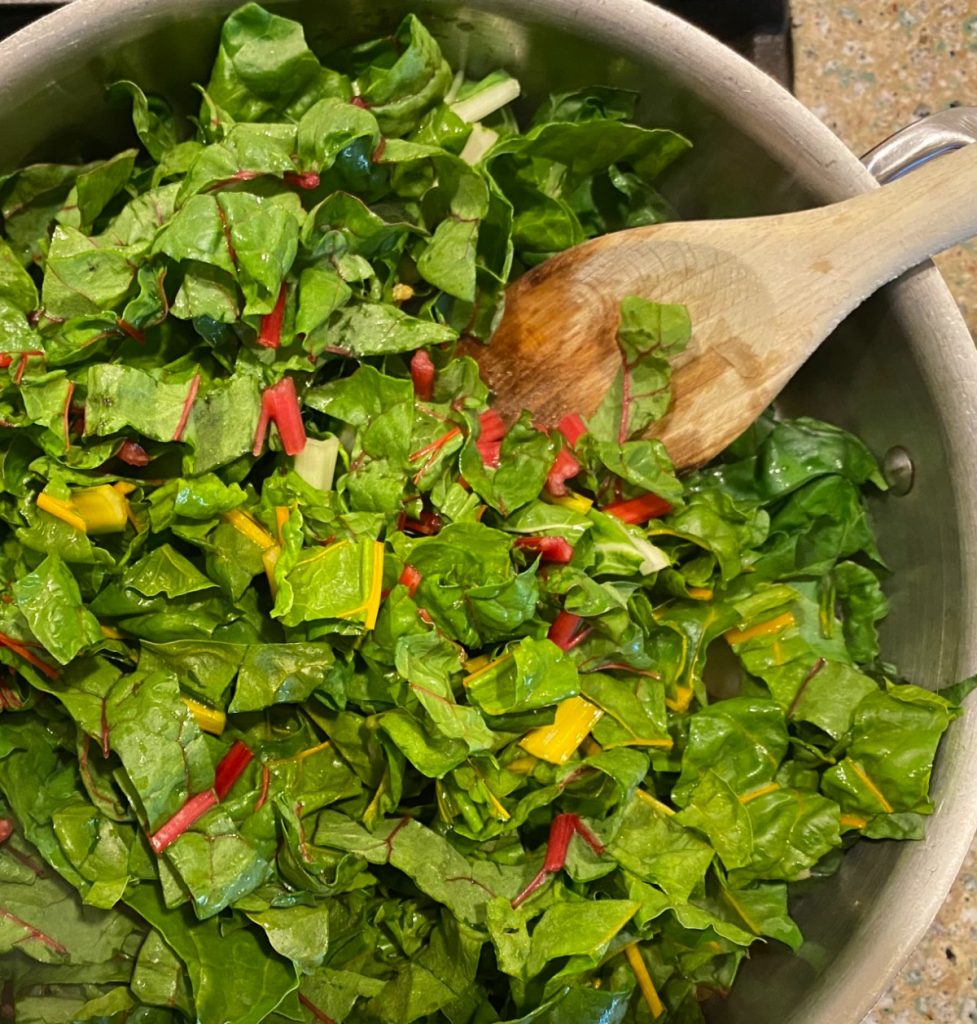 pan with chopped chard leaves