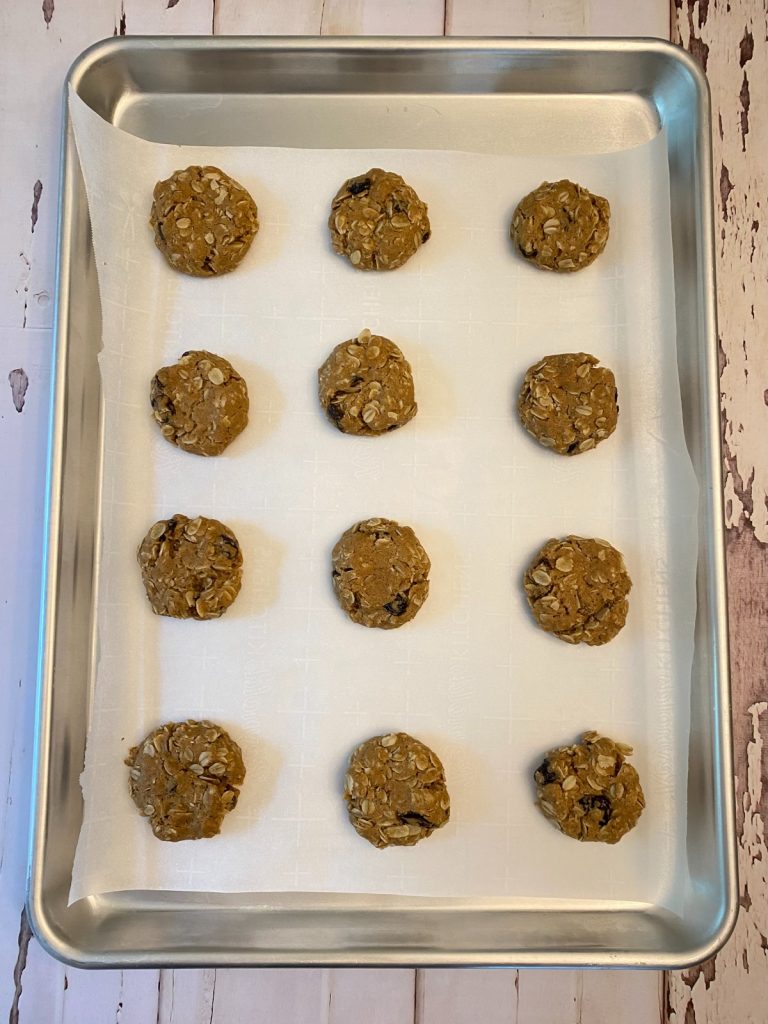 baking sheet with baked cookies on it.