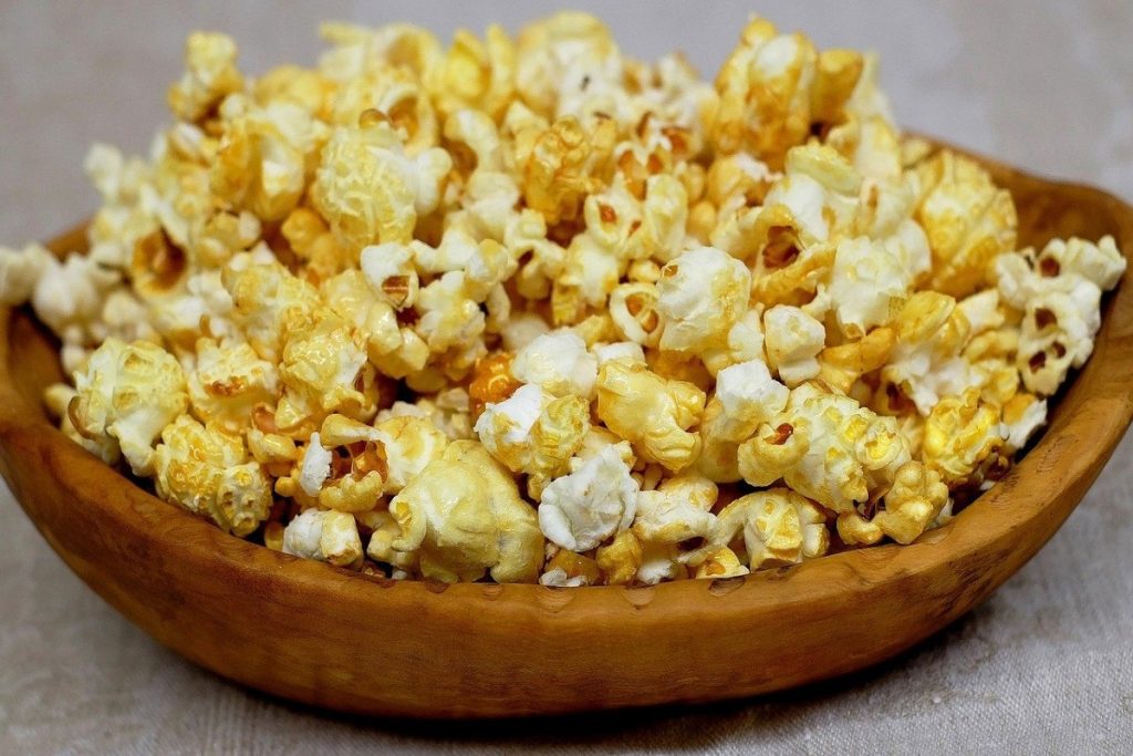 bowl of buttered popcorn.