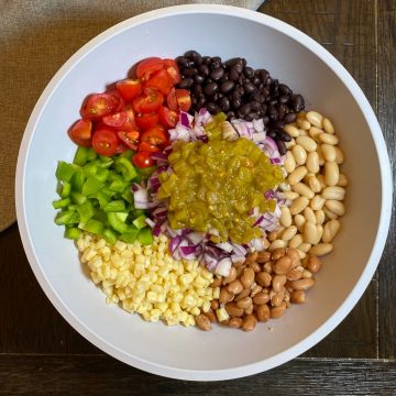 bowl with bean salad ingredients.