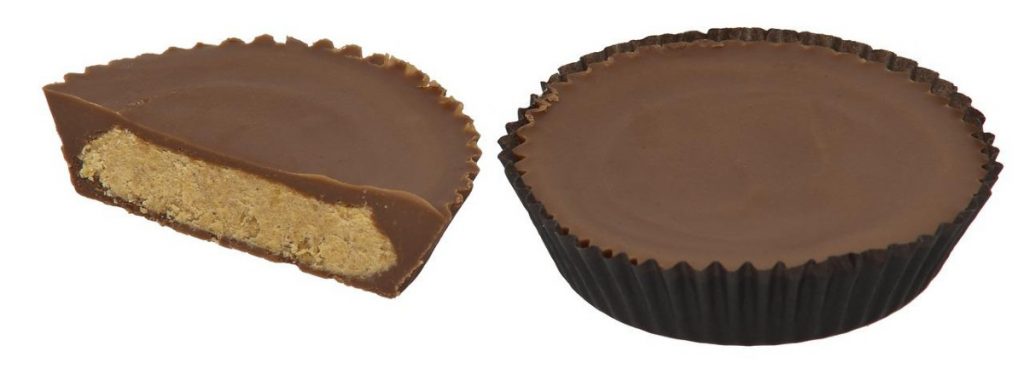 two reese's peanut butter cups, one in half.