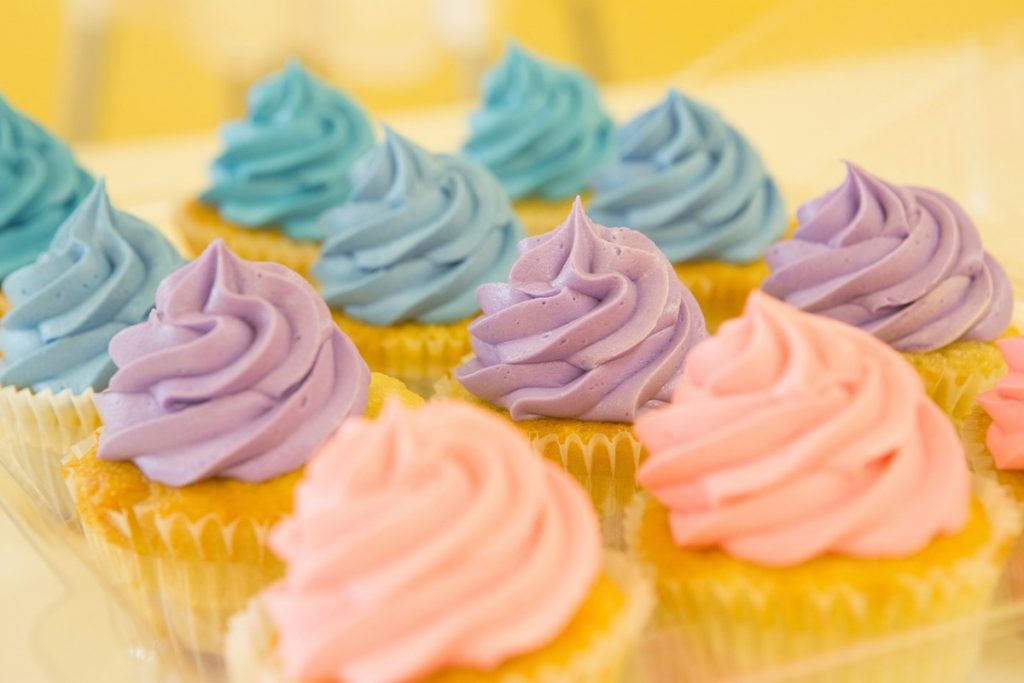 cupcakes with pastel colored frosting.
