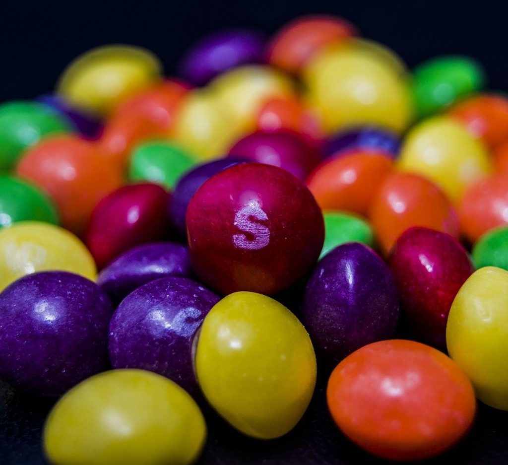 close up of a bunch of skittles.