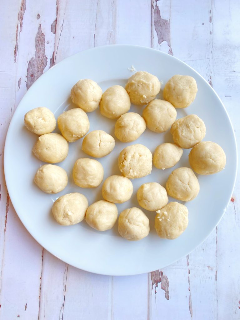 lemon cookie dough balls on plate.