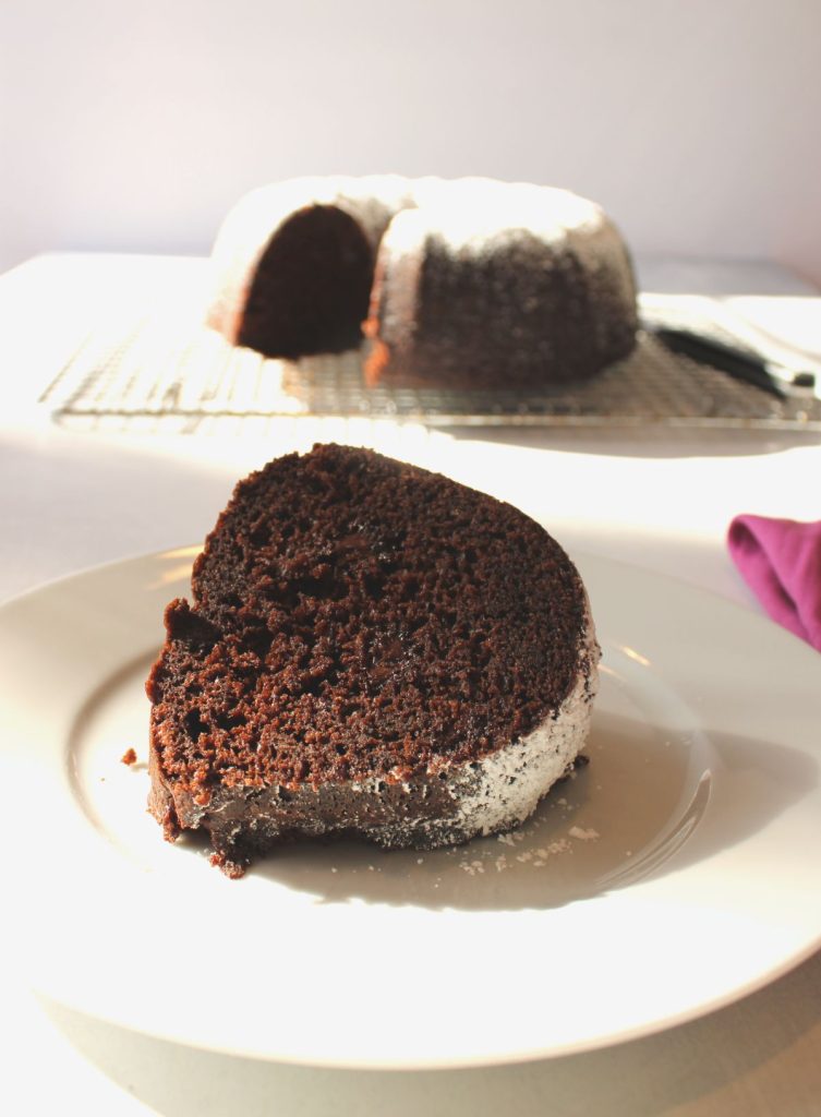 Chocolate Bundt cake on a plate.