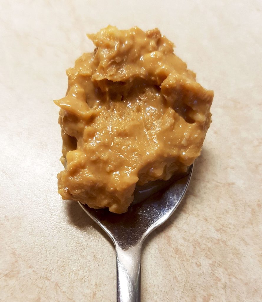 Spoonful of chunky peanut butter.