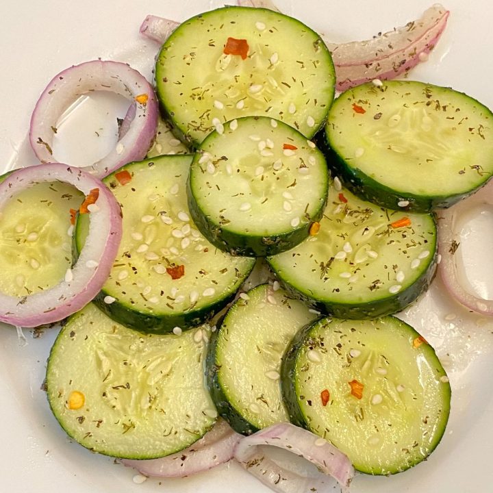 Plate of cucumber salad.