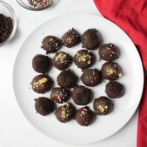 Plate of Oreo truffles with a red napkin.